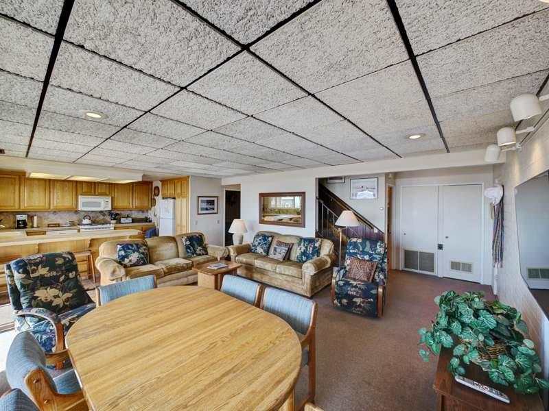 309 Beach Drive Aptos, CA 95003 - Photo 7 of 14 a bed room with furniture and a flat screen tv