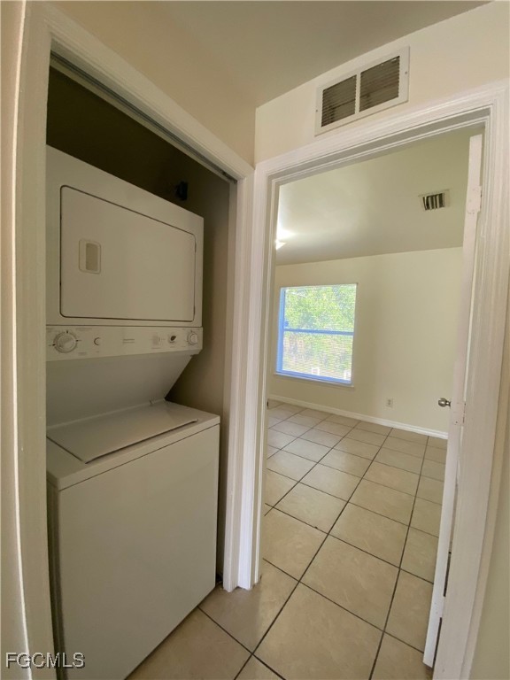 4622 15th Street Southwest Lehigh Acres, FL 33973 - Photo 12 of 15 a utility room with dryer and washer