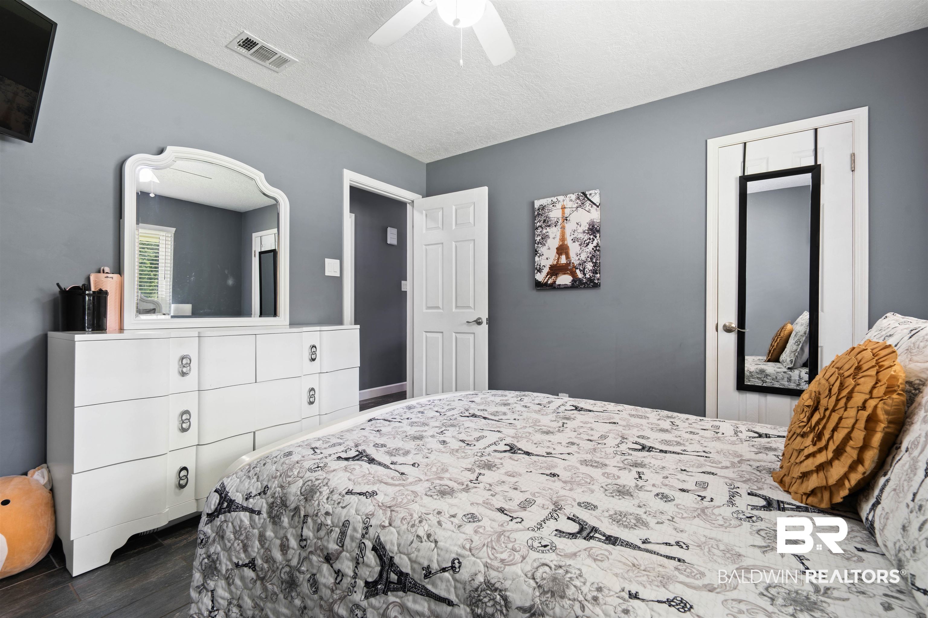 2000 Campfire Drive Semmes, AL 36575 - Photo 16 of 26 Bedroom with wood-type flooring, a textured ceiling, and ceiling fan