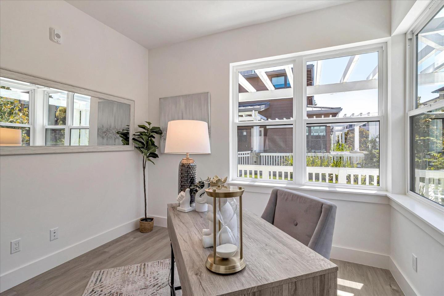 1998 Montecito Avenue Mountain View, CA 94043 - Photo 12 of 29 a view of a dining room with furniture a chandelier and wooden floor