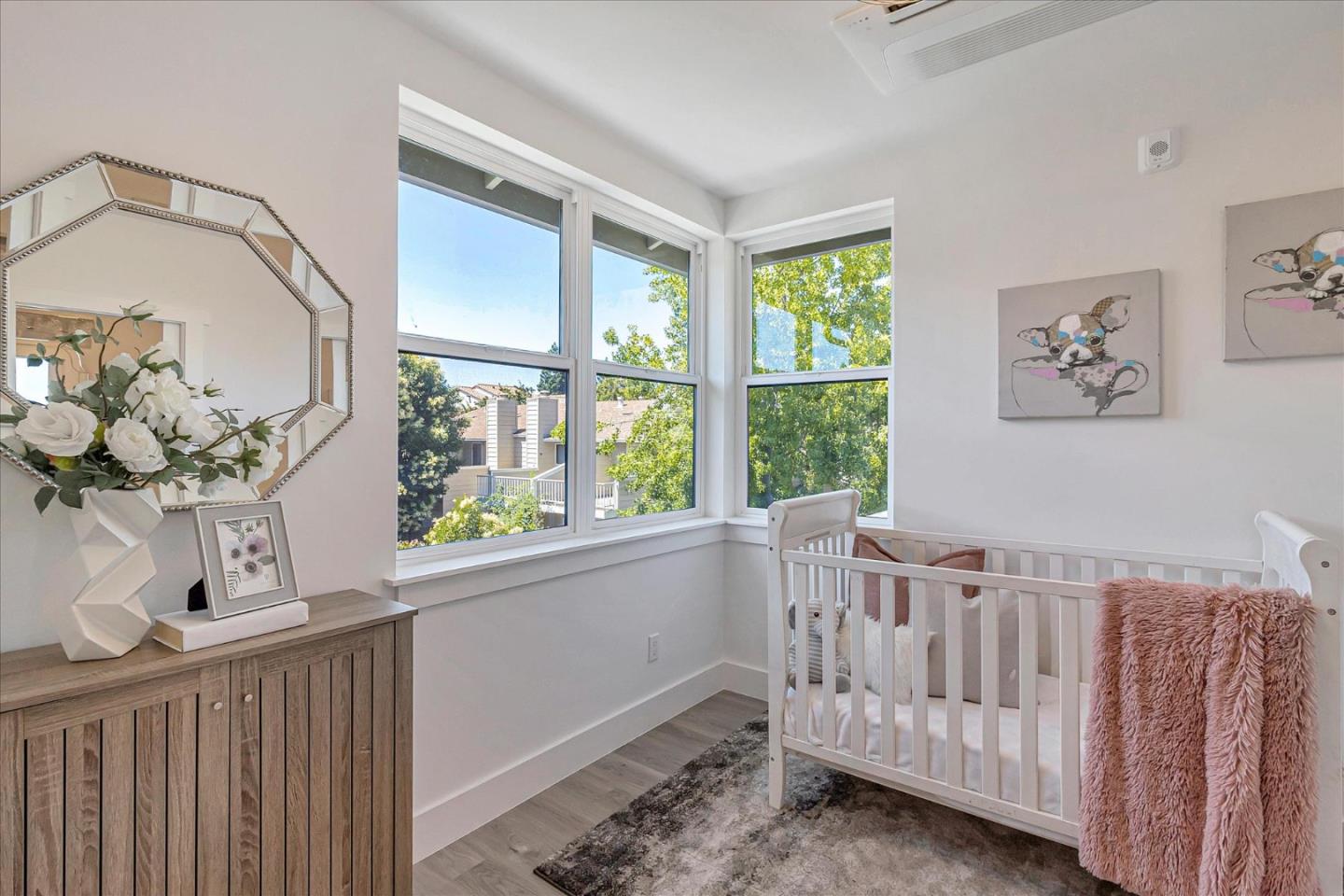 1998 Montecito Avenue Mountain View, CA 94043 - Photo 15 of 29 a view of a bedroom with wooden floor and windows