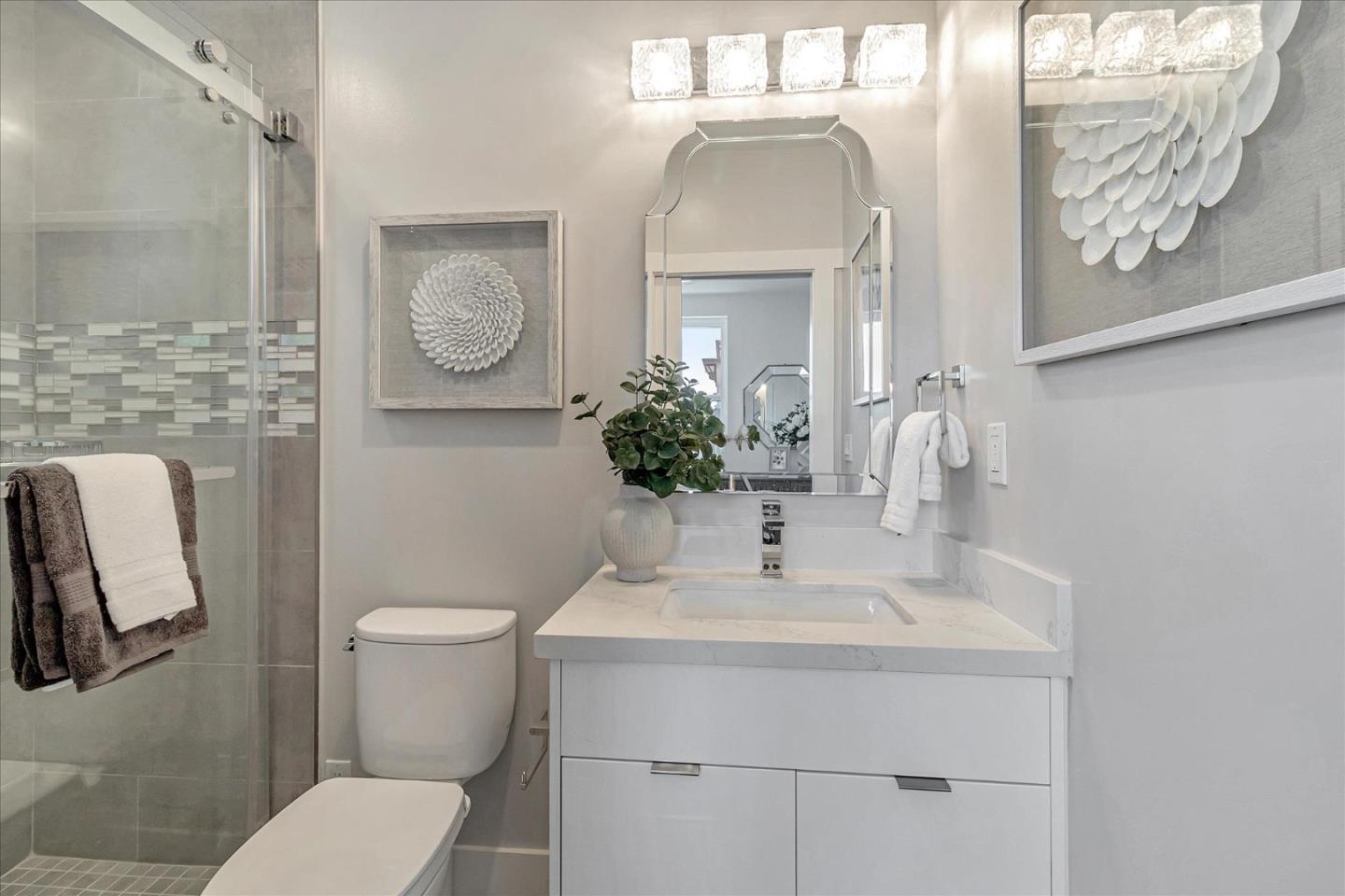 1998 Montecito Avenue Mountain View, CA 94043 - Photo 21 of 29 a bathroom with a toilet sink and mirror