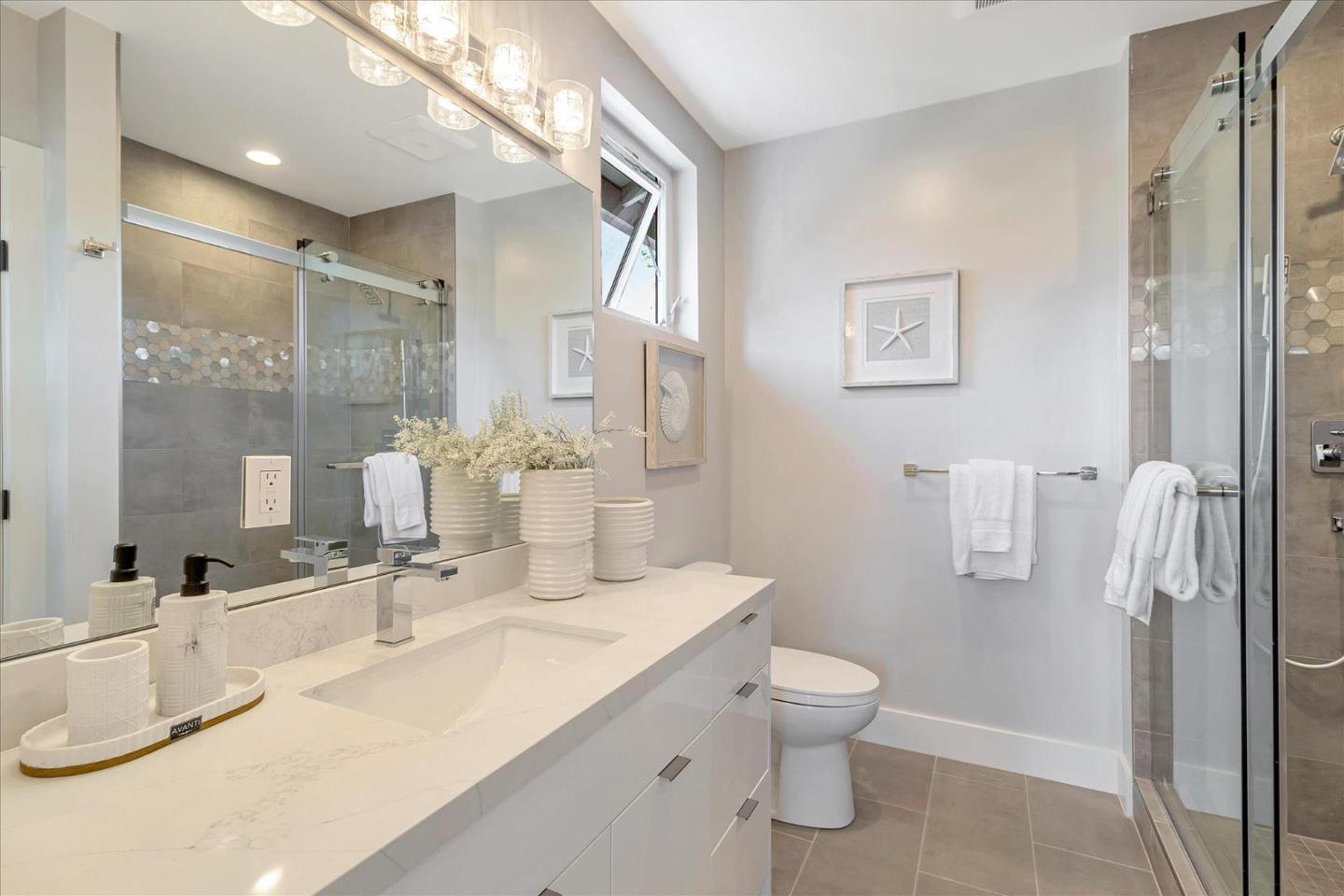 1998 Montecito Avenue Mountain View, CA 94043 - Photo 22 of 29 a bathroom with a granite countertop sink toilet and shower