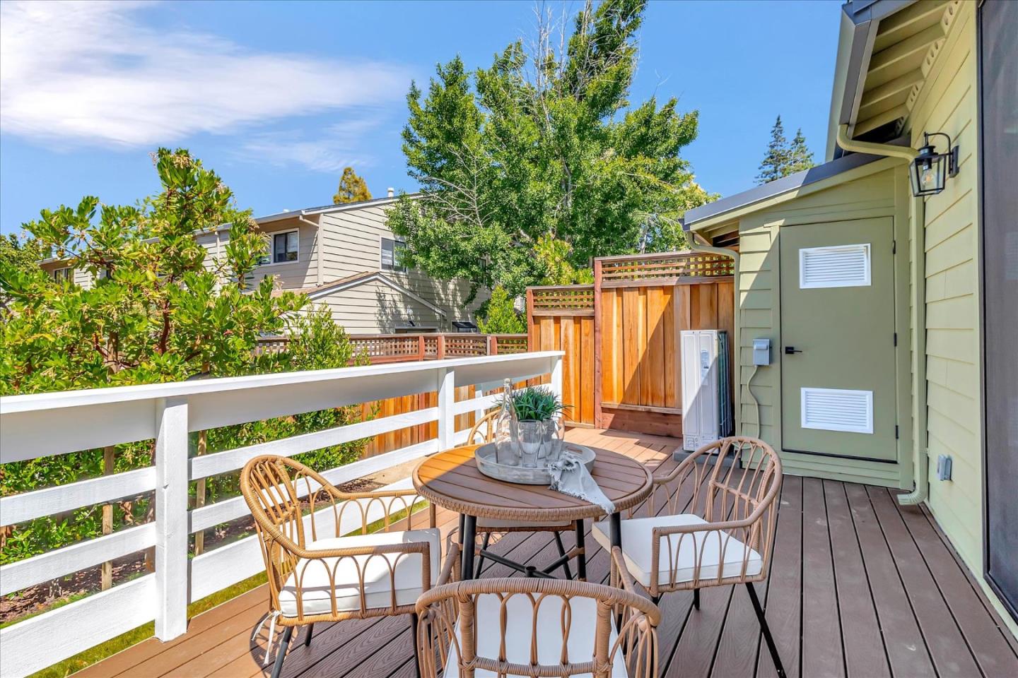 1998 Montecito Avenue Mountain View, CA 94043 - Photo 24 of 29 a view of a balcony with table and chairs and wooden floor