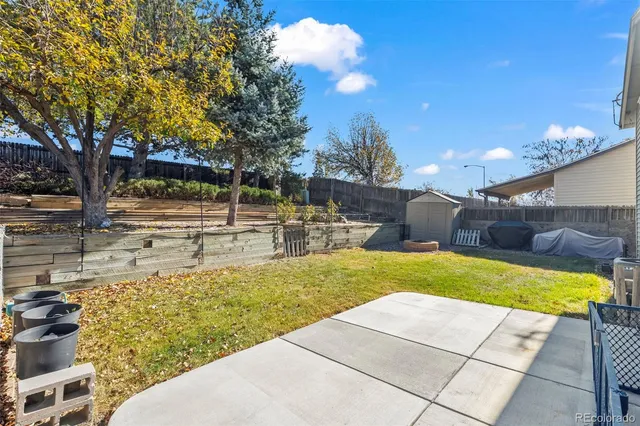 a view of yard with outdoor seating