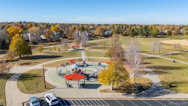 a view of swimming pool and outdoor seating