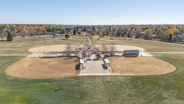 a view of a swimming pool with a lake