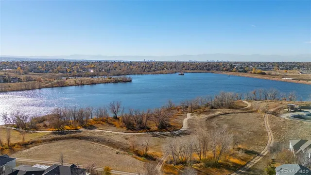 an aerial view of residential building and ocean