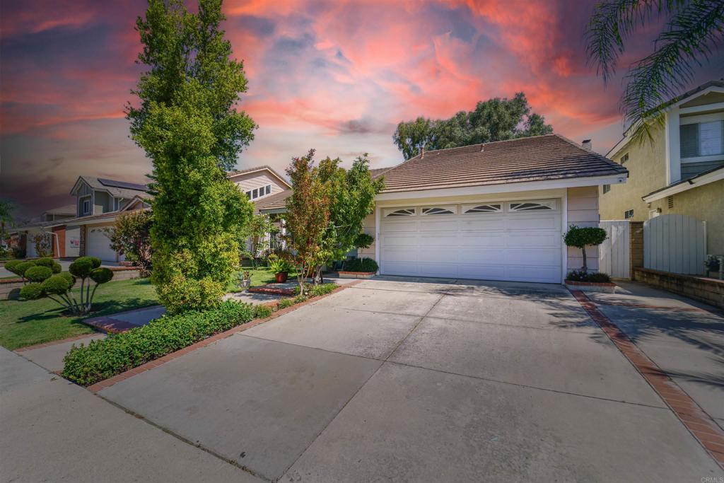 32211 Fall River Road Trabuco Canyon, CA 92679 - Photo 1 of 1 a front view of a house with a yard and garage