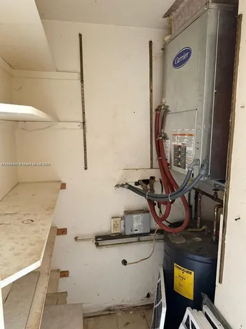 a view of a patio with table and chairs