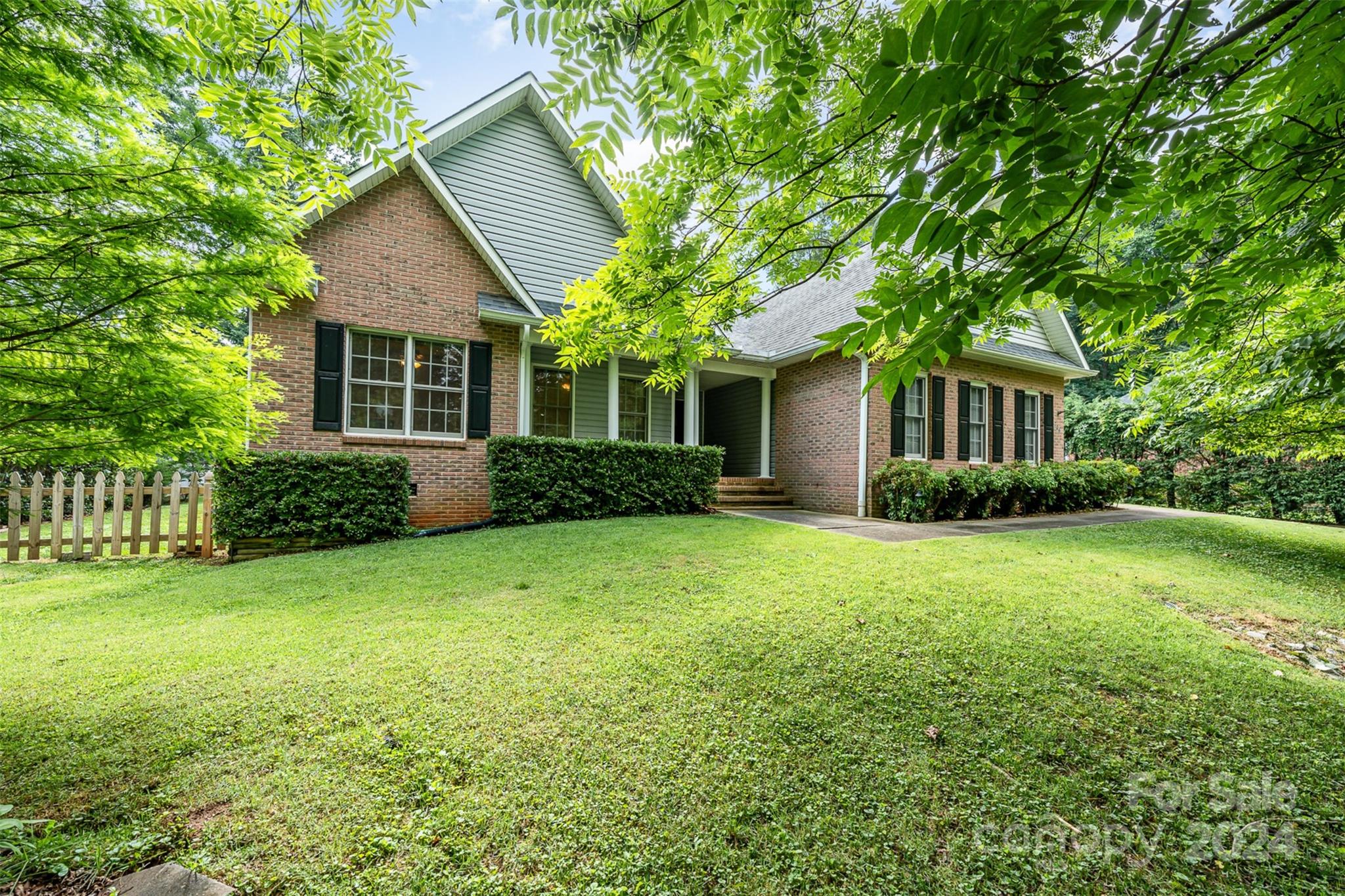 front view of a house and a yard
