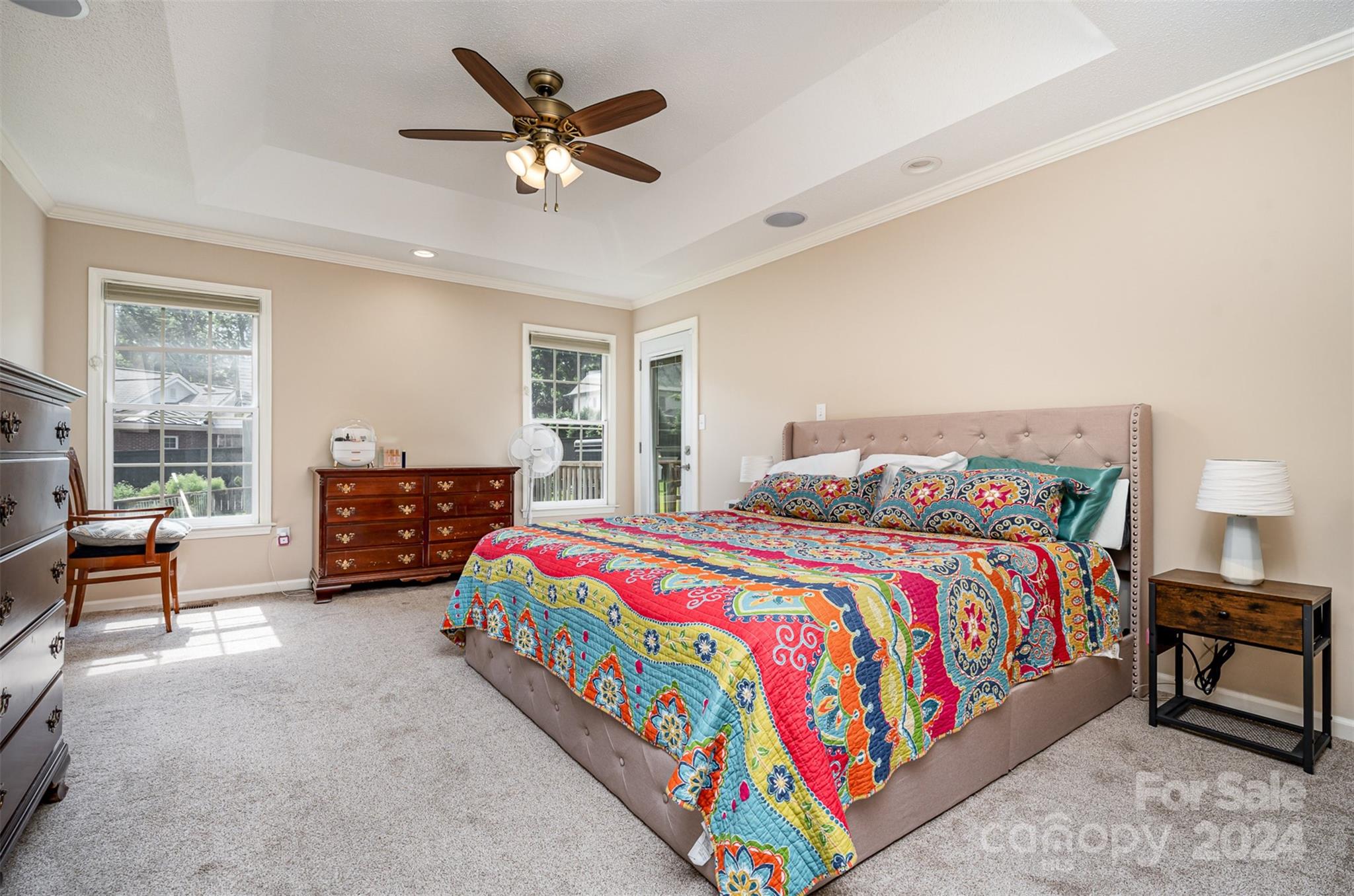 708 1st Avenue North Conover, NC 28613 - Photo 17 of 26 a bedroom with a bed and a chandelier