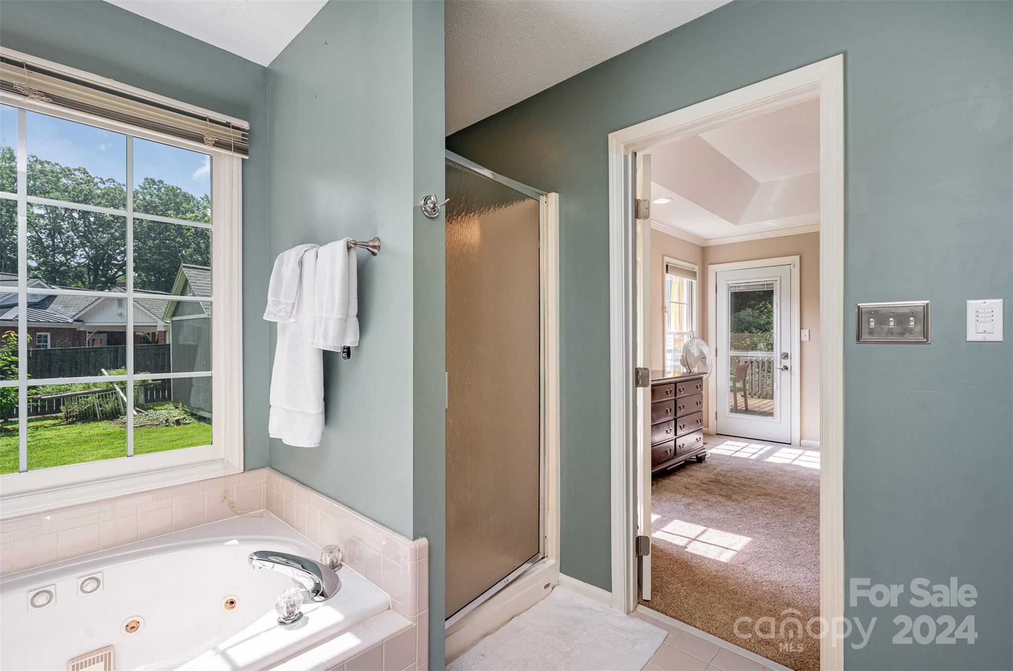 708 1st Avenue North Conover, NC 28613 - Photo 19 of 26 a bathroom with a tub and a view of bathroom