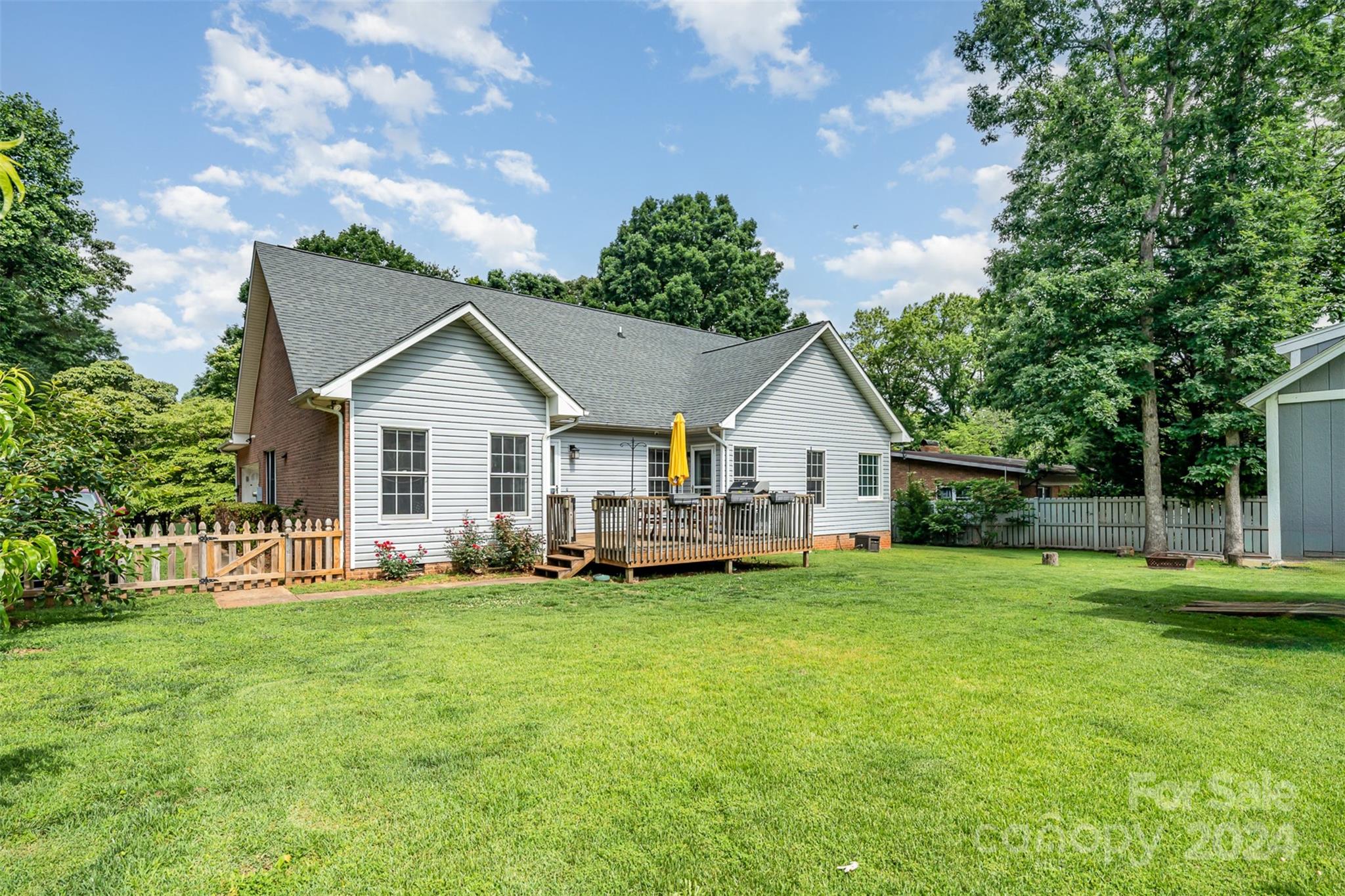 708 1st Avenue North Conover, NC 28613 - Photo 24 of 26 a view of a house with a yard and sitting area