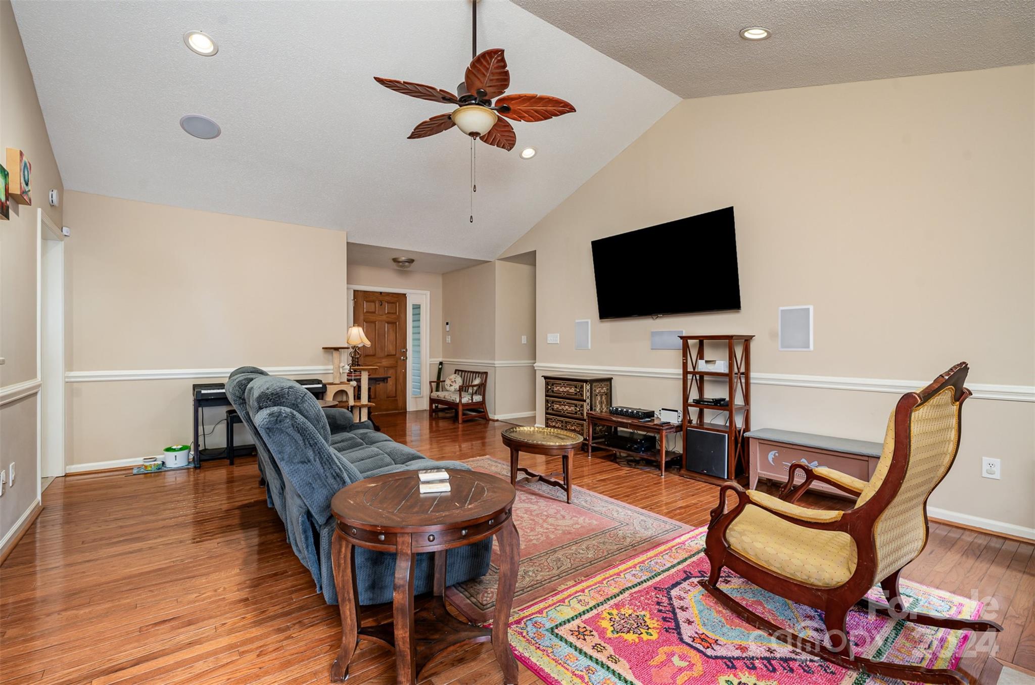 708 1st Avenue North Conover, NC 28613 - Photo 4 of 26 a living room with furniture and a flat screen tv