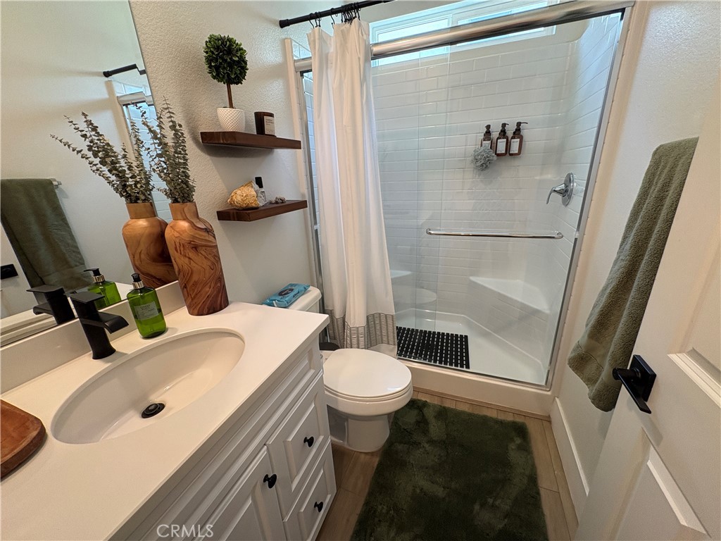 7664 Sweet Rnch Circle Riverside, CA 92507 - Photo 13 of 29 Downstairs 3/4 bathroom