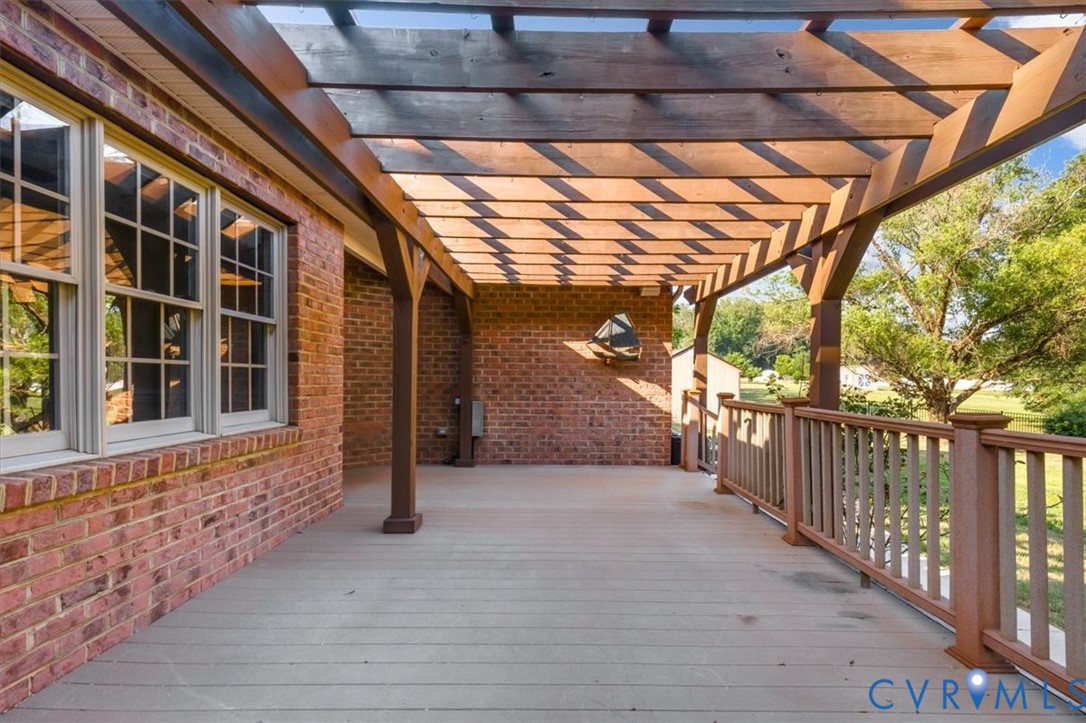 1437 Palmore Road Powhatan, VA 23139 - Photo 49 of 60 Outdoor deck featuring a wood-finish pergola, comp
