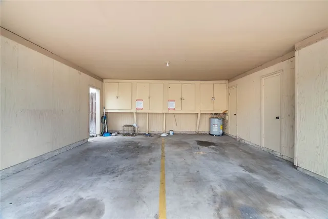 a view of a livingroom with shelves