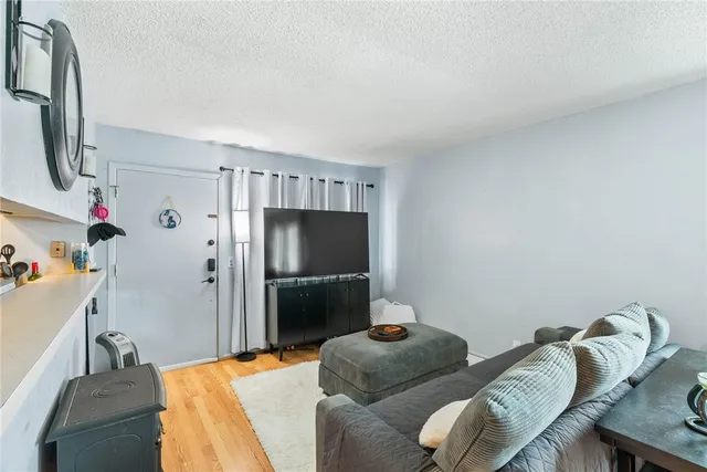 a bedroom with furniture and a bed