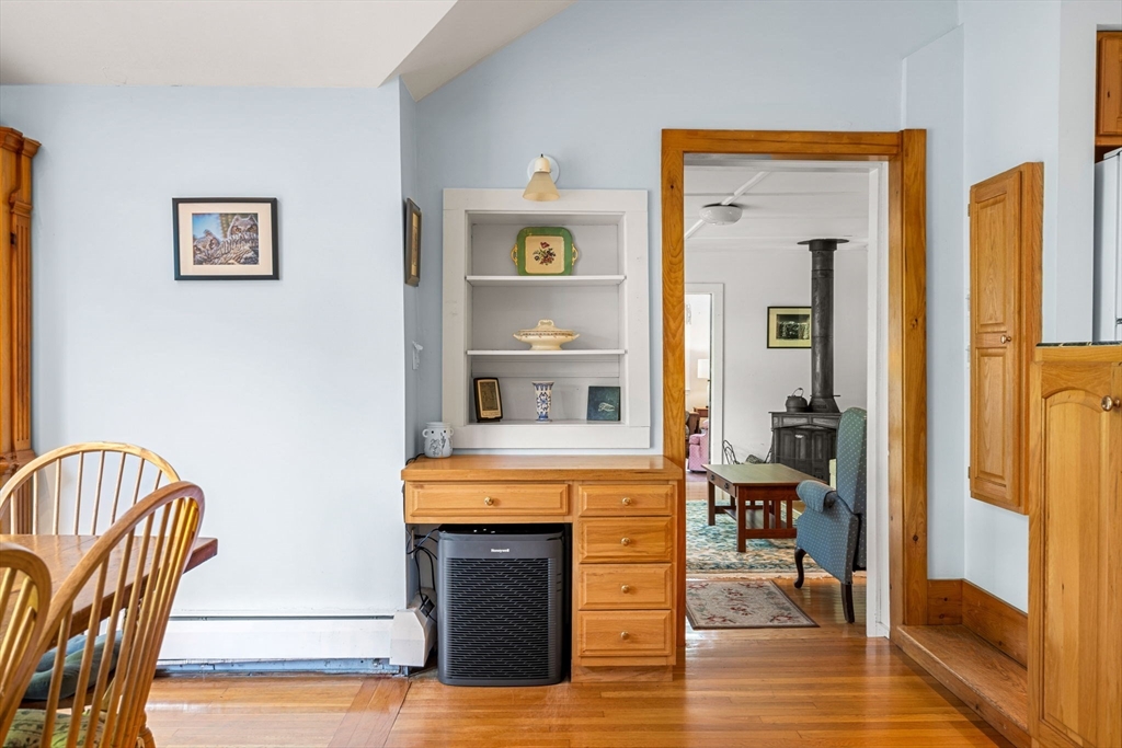 21 Preston Beach Road Marblehead, MA 01945 - Photo 14 of 34 a view of a livingroom with furniture and a fireplace