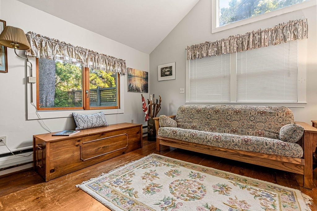 21 Preston Beach Road Marblehead, MA 01945 - Photo 8 of 34 a living room with furniture and a window
