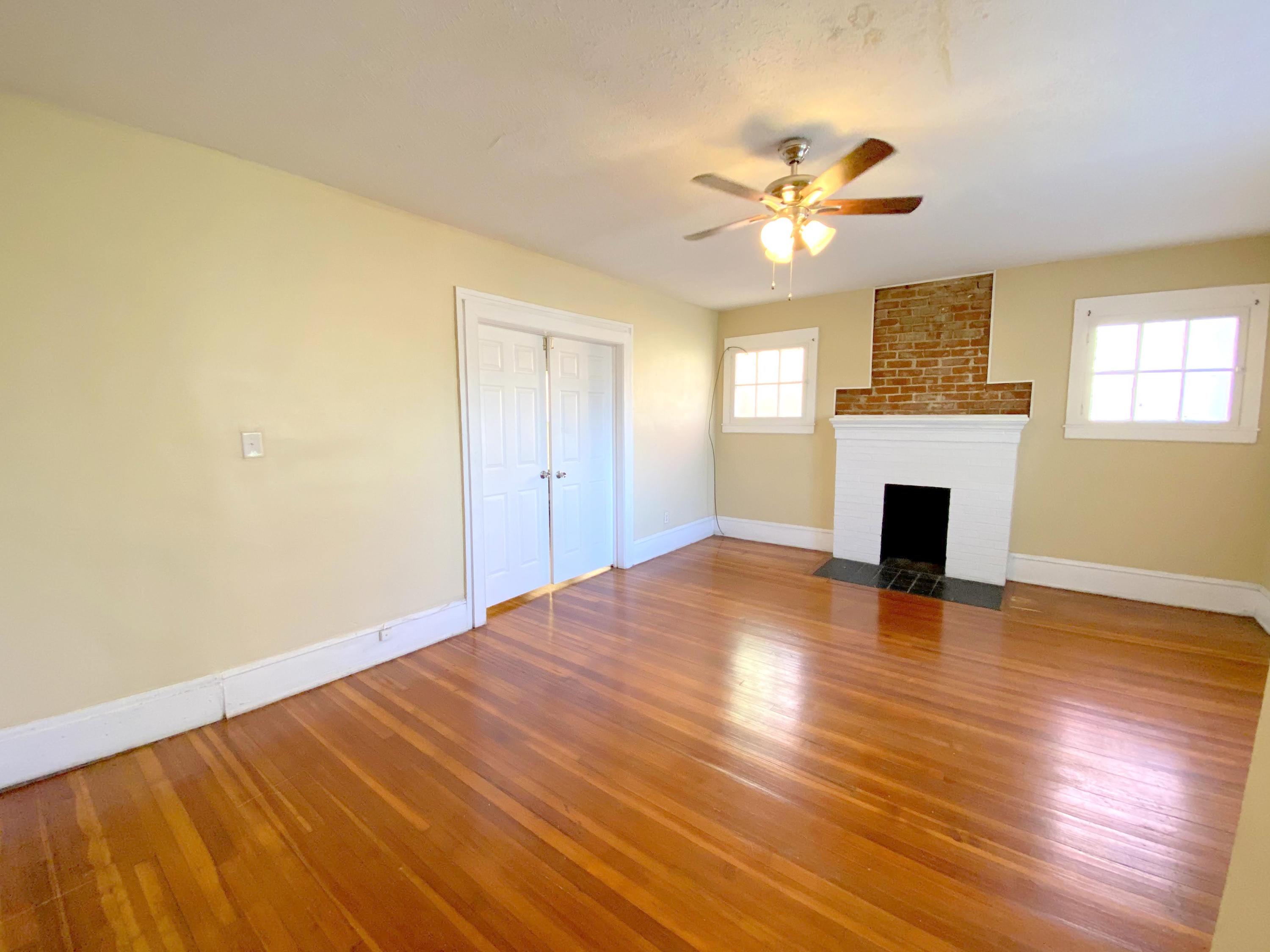 1306 Patterson Avenue Southwest, Unit 3 Roanoke, VA 24016 - Photo 20 of 28 a view of empty room with wooden floor and fan