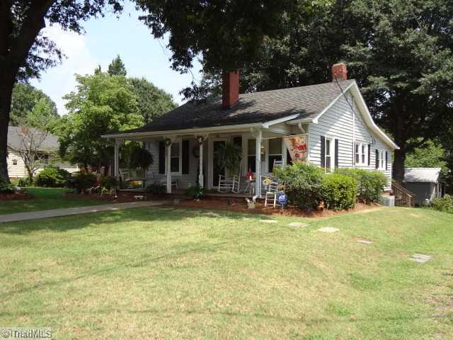 7701 Broad Street Rural Hall, NC 27045 - Photo 1 of 16 Exterior Front. 2 Bedroom 1.5 bath, partial basement, workshop/carport in the back with a great porch and small deck on the back.