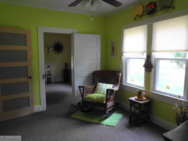 7701 Broad Street Rural Hall, NC 27045 - Photo 15 of 16 Exterior Front. Sitting room with lots of natural lighting.