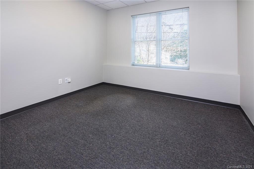 442 South Main Street, Unit 14 Davidson, NC 28036 - Photo 10 of 25 an empty room with a window