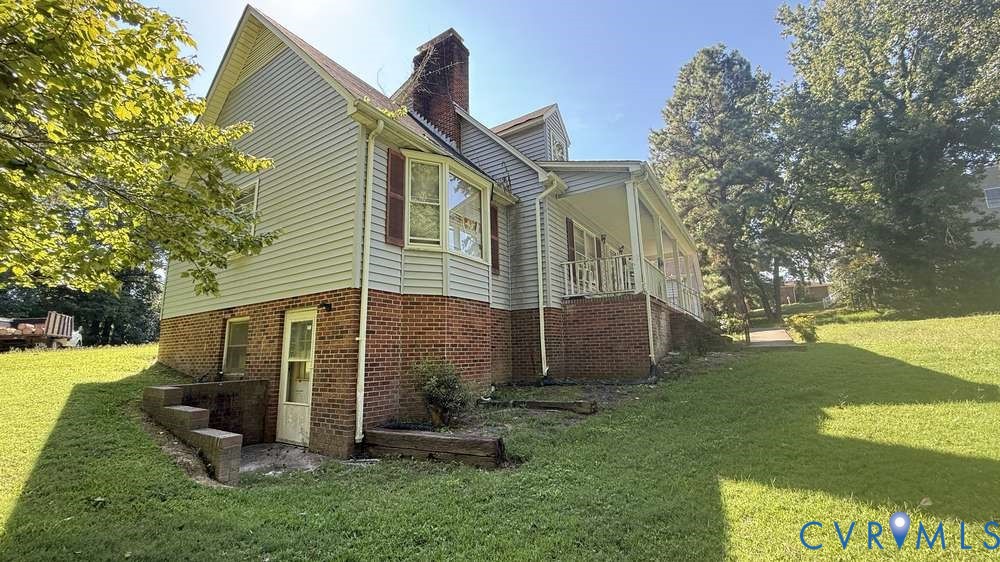 320 Wilson Road Danville, VA 24541 - Photo 9 of 17 Siding exterior with brick foundation and a covere