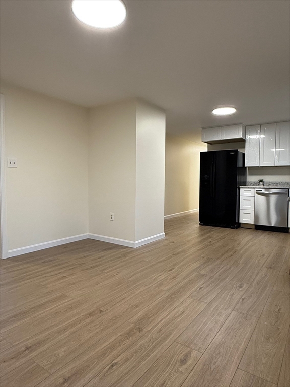 17 Horace Street, Unit 2 Boston, MA 02128 - Photo 3 of 14 a view of empty room with wooden floor