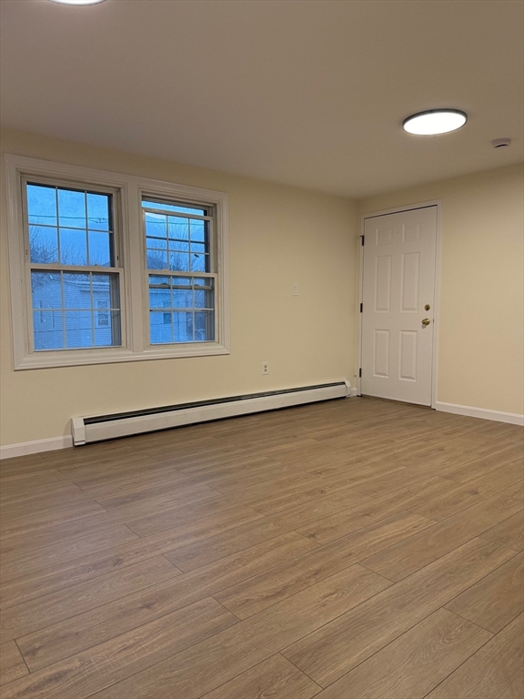 17 Horace Street, Unit 2 Boston, MA 02128 - Photo 4 of 14 a view of a room with wooden floor and window
