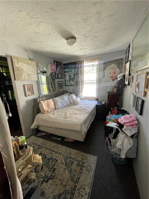 14 Sprain Street Pittsburgh, PA 15212 - Photo 11 of 20 a bedroom with a bed next to a window with the outer view