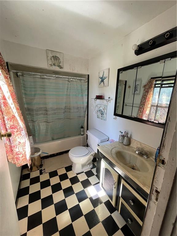 14 Sprain Street Pittsburgh, PA 15212 - Photo 15 of 20 a bathroom with a sink a toilet and shower