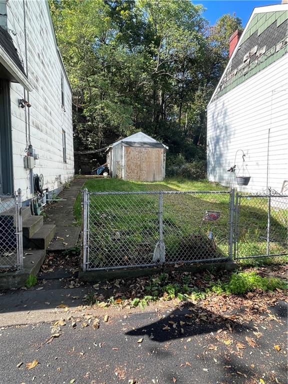 14 Sprain Street Pittsburgh, PA 15212 - Photo 20 of 20 a front view of a house with a yard garage