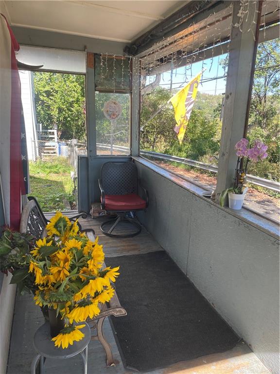 14 Sprain Street Pittsburgh, PA 15212 - Photo 4 of 20 a room with yard view and a floor to ceiling window