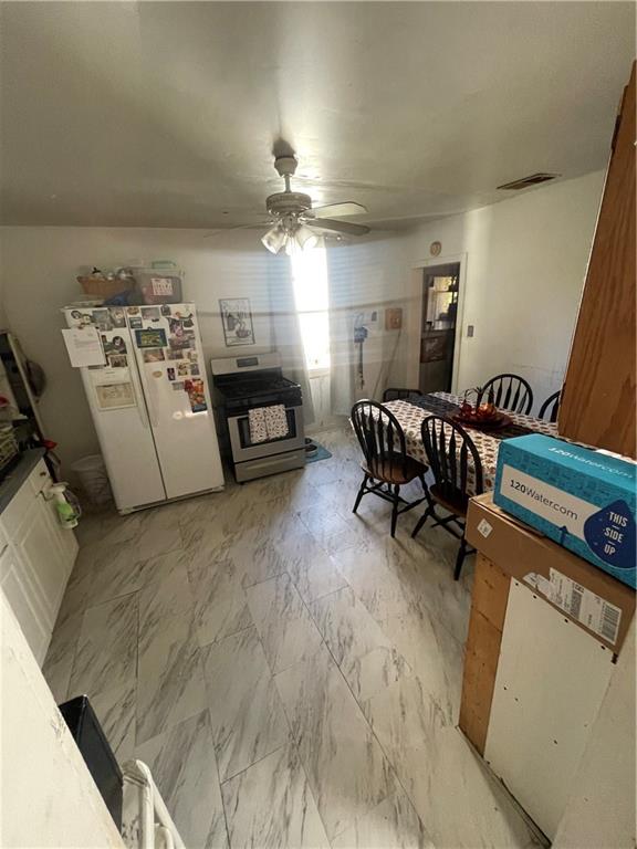 14 Sprain Street Pittsburgh, PA 15212 - Photo 8 of 20 a living room with furniture and a chandelier