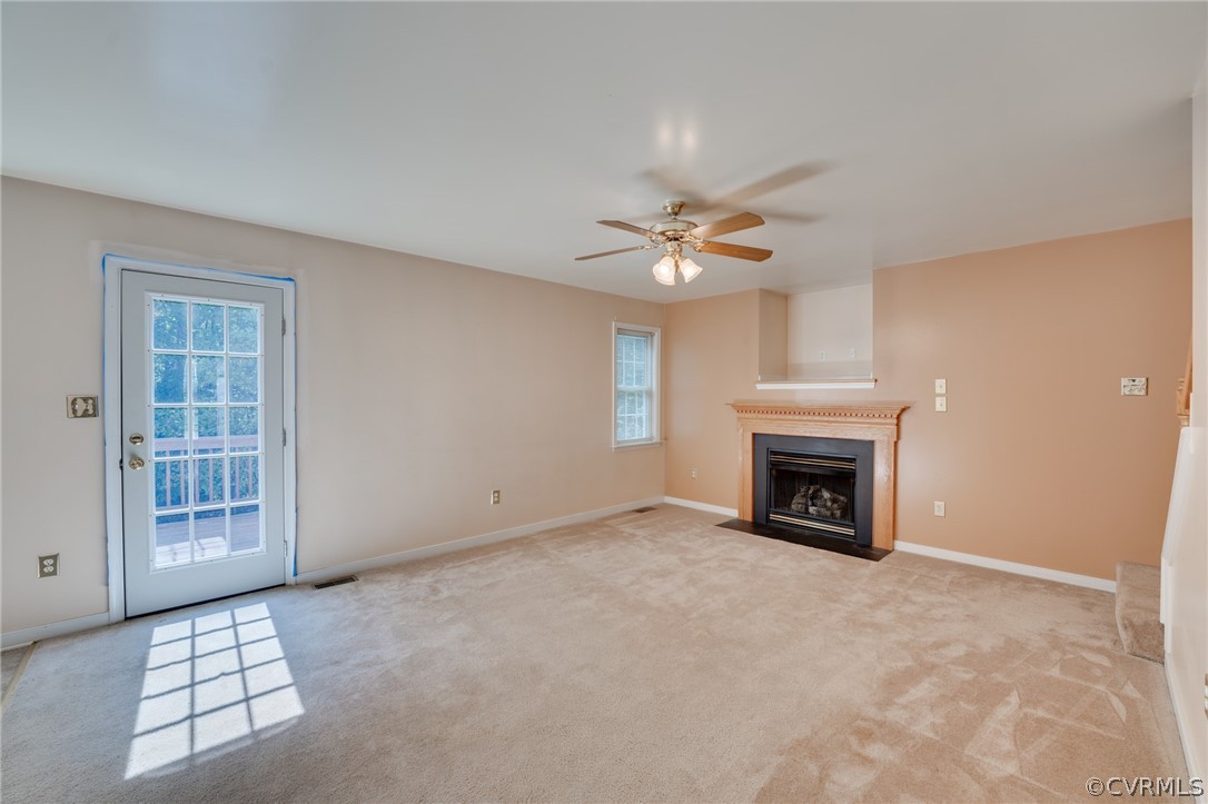 5517 Takach Road Prince George, VA 23875 - Photo 29 of 50 an empty room with windows and fireplace
