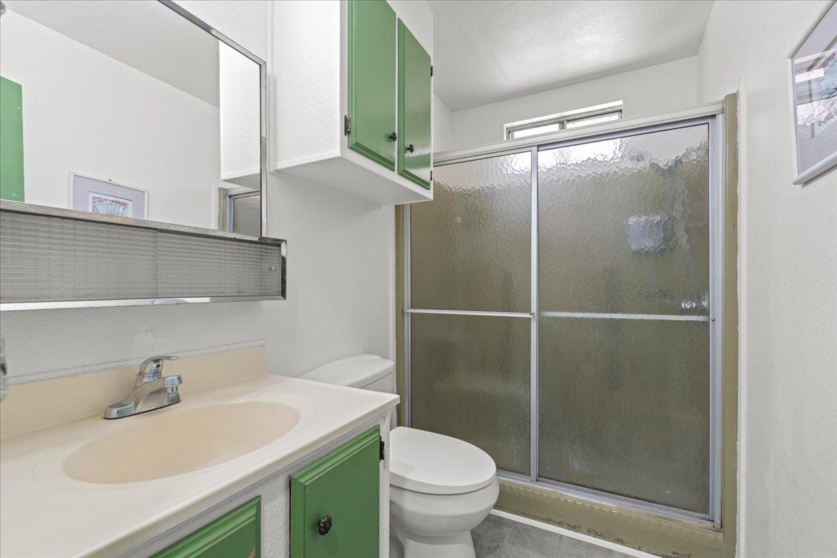 6300 Election Lane, Unit 118 Sacramento, CA 95828 - Photo 15 of 38 a bathroom with a sink toilet and shower