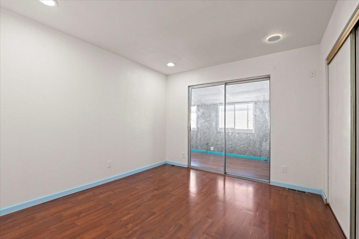 6300 Election Lane, Unit 118 Sacramento, CA 95828 - Photo 17 of 38 a view of wooden floor and windows in a room