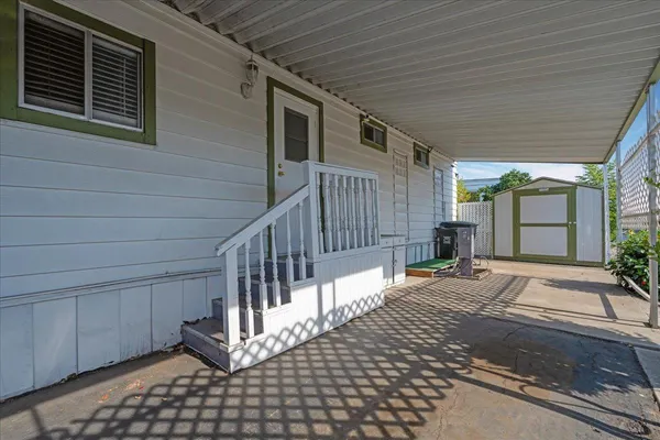 a view of a balcony with door