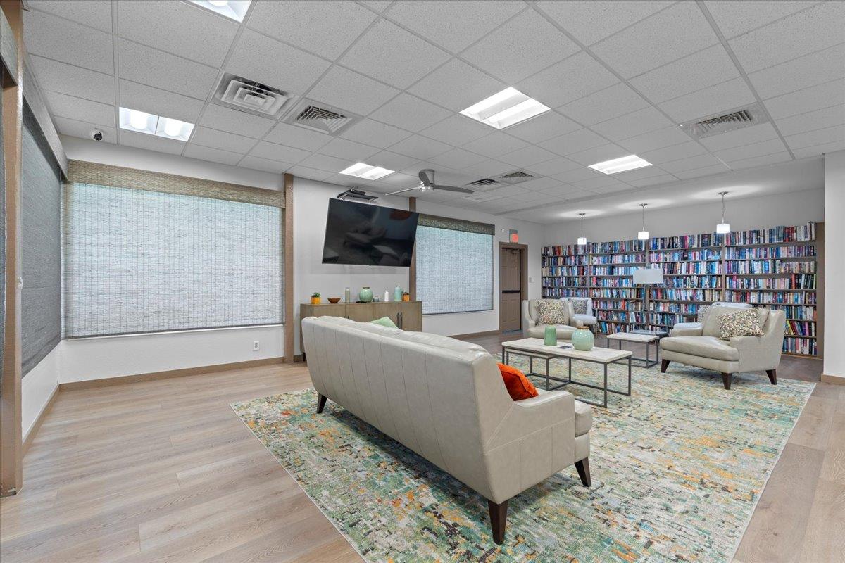 6300 Election Lane, Unit 118 Sacramento, CA 95828 - Photo 33 of 38 a living room with furniture and a flat screen tv