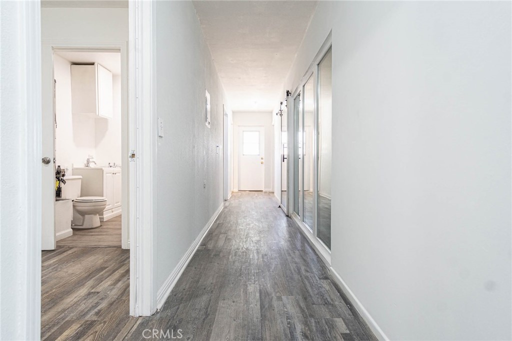 13114 Choco Road Apple Valley, CA 92308 - Photo 20 of 75 a view of a bathroom with a sink and a toilet