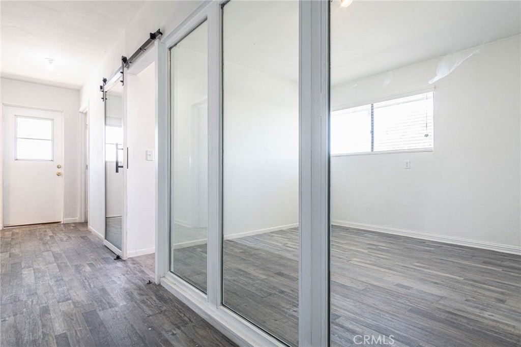 13114 Choco Road Apple Valley, CA 92308 - Photo 22 of 75 a view of a bathroom with wooden floor