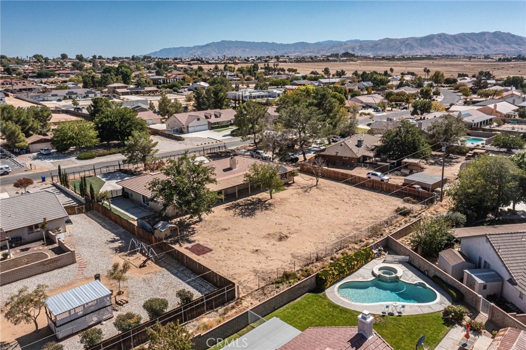 13114 Choco Road Apple Valley, CA 92308 - Photo 64 of 75 an aerial view of residential houses with outdoor space