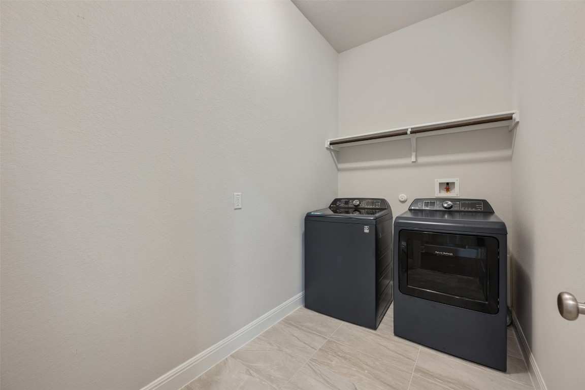 686 Treadwell Lane Kyle, TX 78640 - Photo 34 of 40 a view of a storage & utility room in a house
