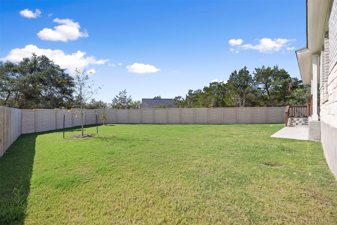 686 Treadwell Lane Kyle, TX 78640 - Photo 39 of 40 a view of a backyard