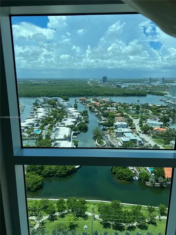 a view of a garden from a balcony