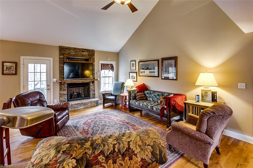 Great Room, hardwoods floors, gas log rock fireplace