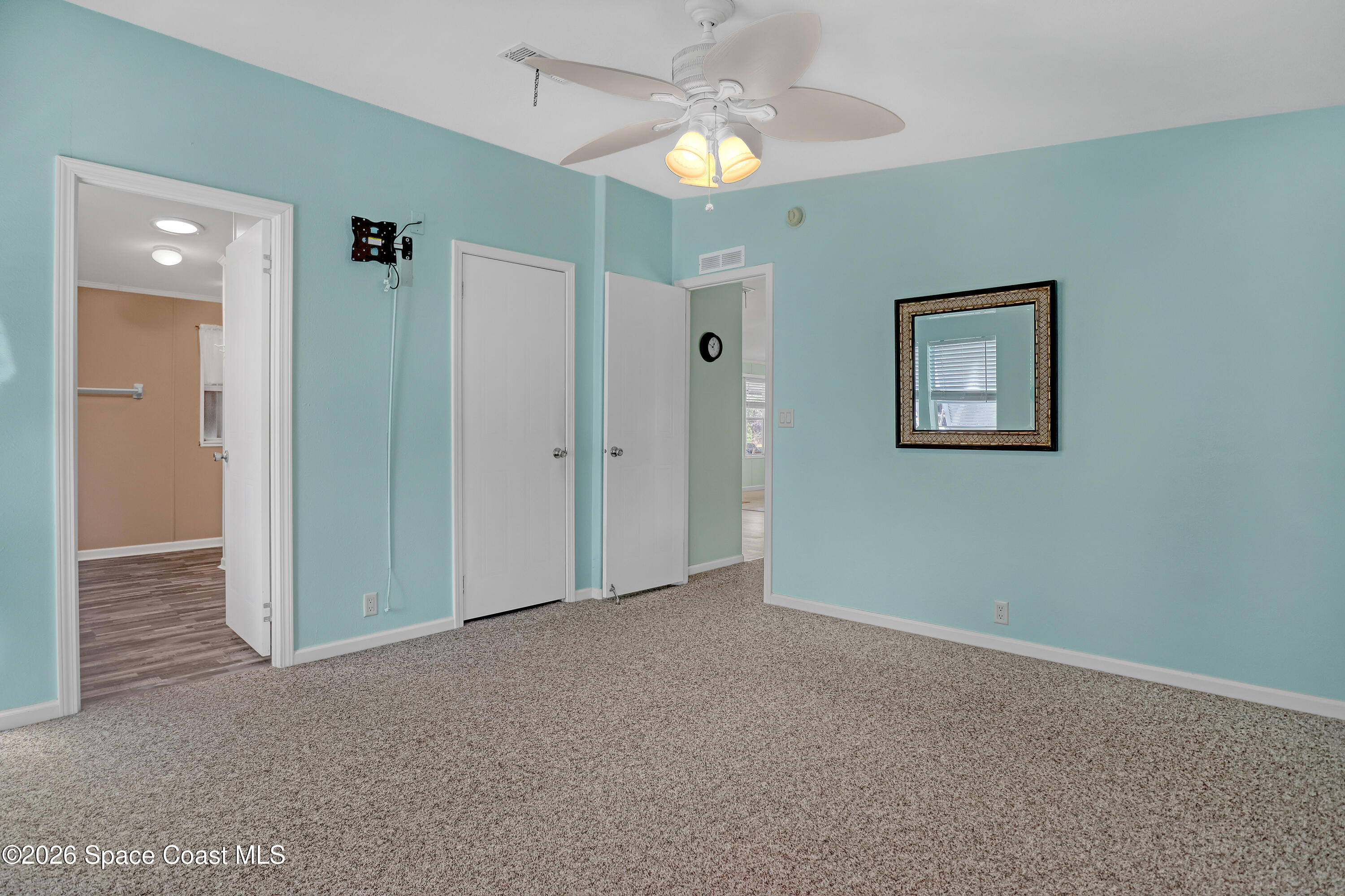 7547 Boxelder Road Micco, FL 32976 - Photo 24 of 53 wooden floor in an empty room